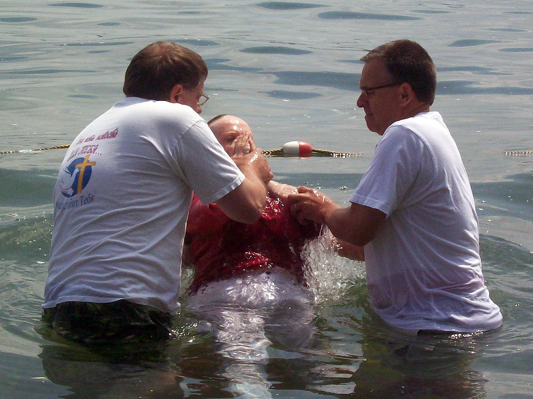 Picture of a baptism in Canandaigua Lake
